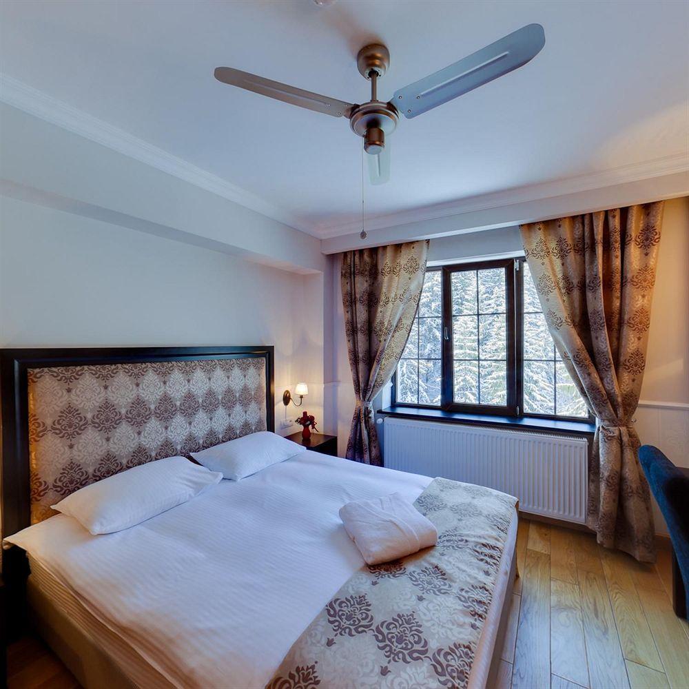 Rizzo Boutique Hotel Пояна-Брашов Экстерьер фото