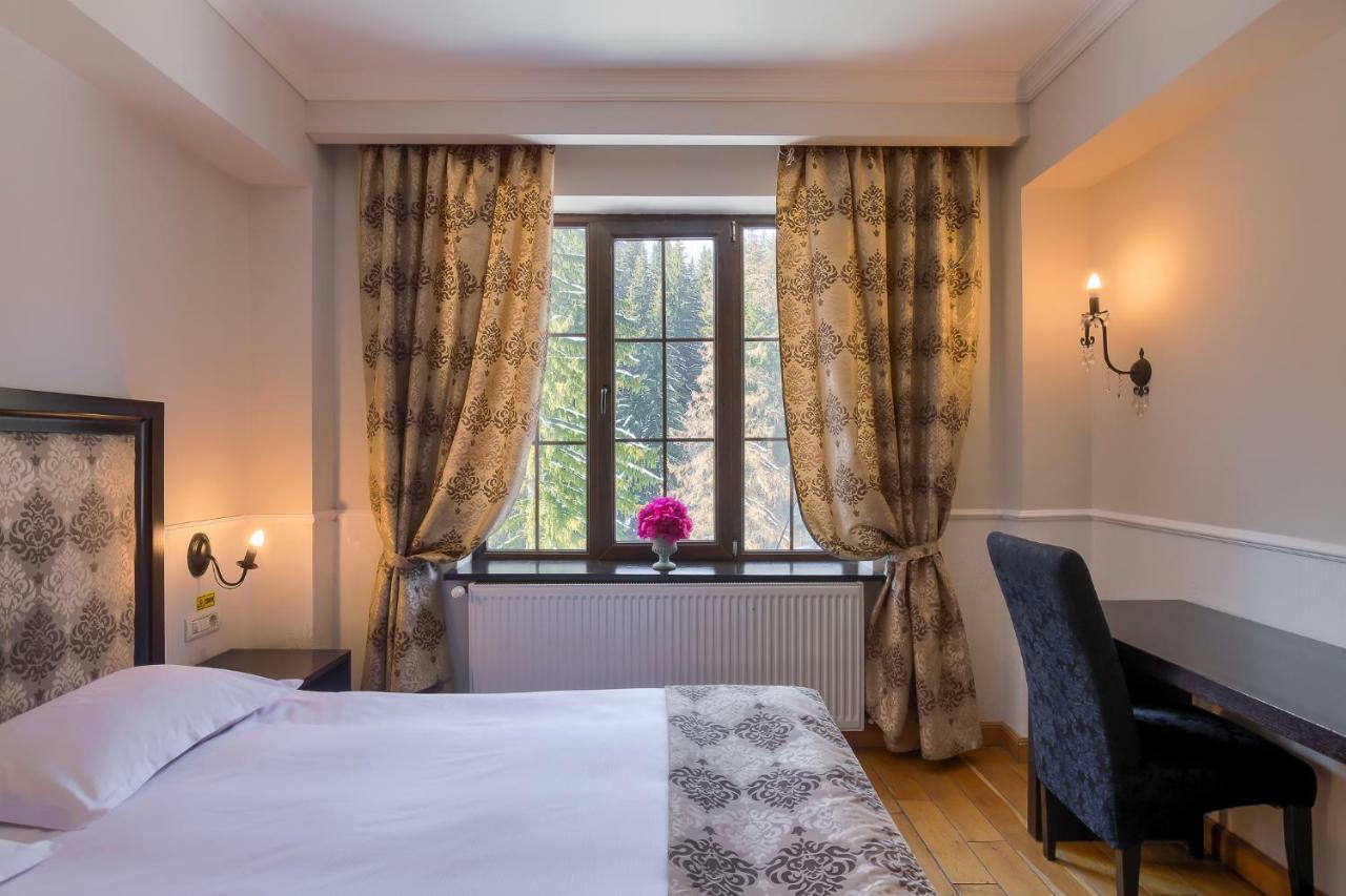 Rizzo Boutique Hotel Пояна-Брашов Экстерьер фото